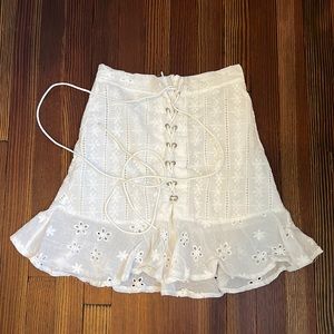 Lace up white mini skirt